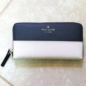 Kate Spade black and cream zip-around wallet